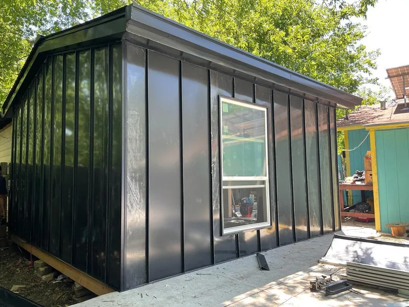 Black standing seam metal wall panels for Metal Roof Installation in Gardiner